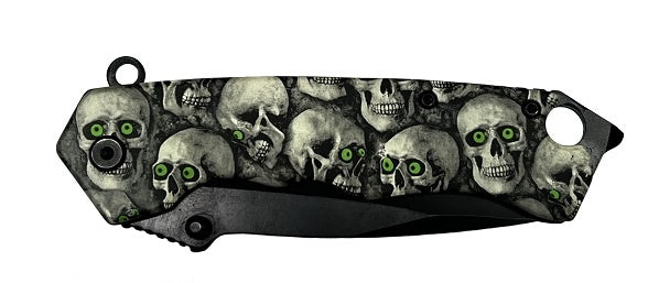 COUTEAU AVEC TÊTES DE MORTS