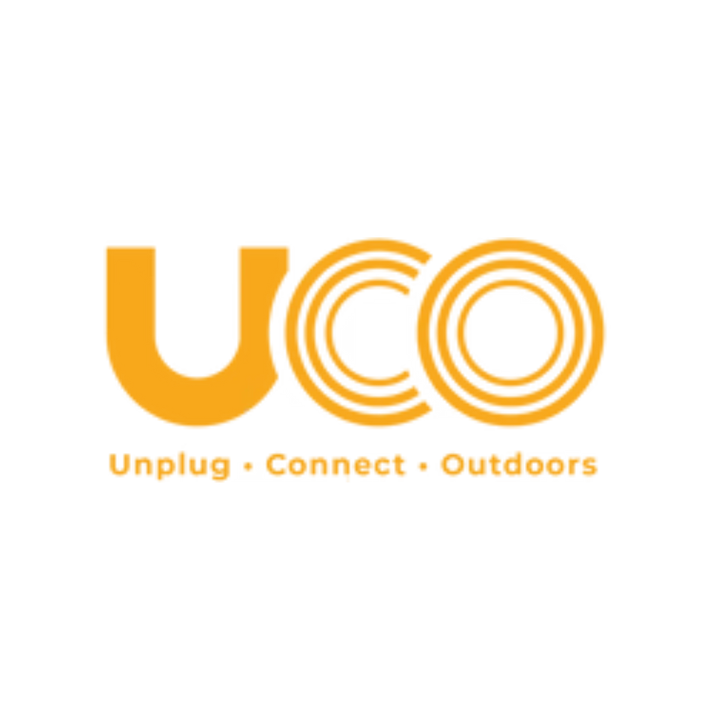 Logo Orange UCO avec lettres épaisses et stylisées, et un effet de dégradé subtil.