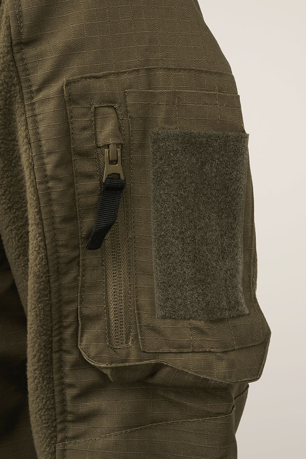 VESTE EN POLAR ET TISSU RIPSTOP BRANDIT