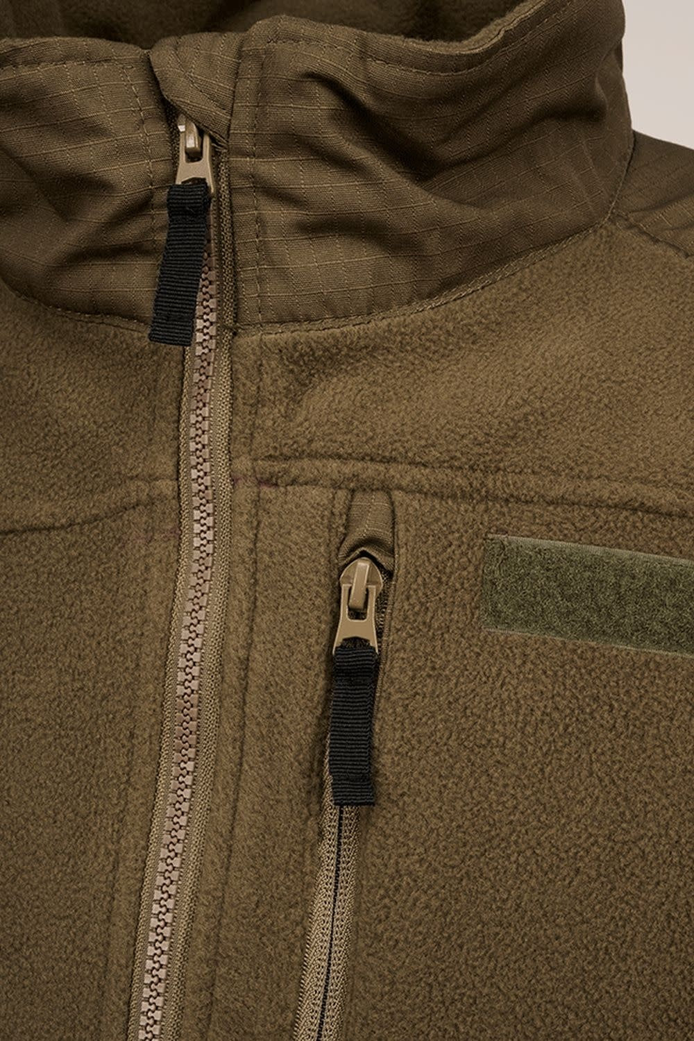 VESTE EN POLAR ET TISSU RIPSTOP BRANDIT